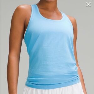 Lululemon Swiftly Tech Racerback Tank Top Hip Length. COLOR IS LILAC. Size 8.